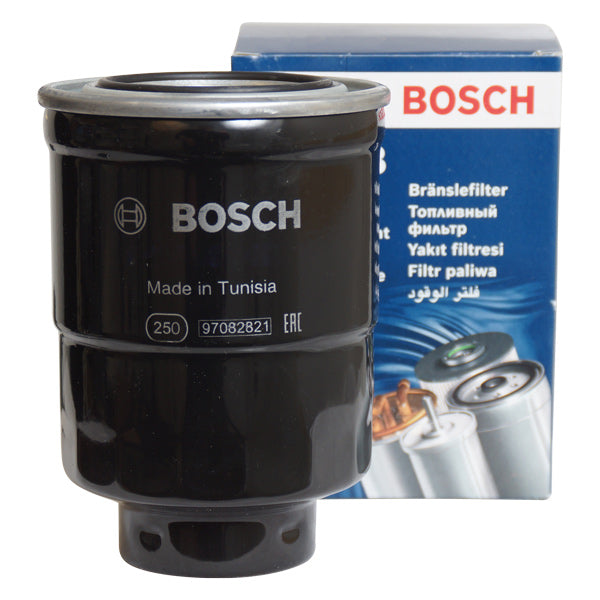 Brændstoffilter fra Bosch til Yanmar Nanni, vist fra siden.